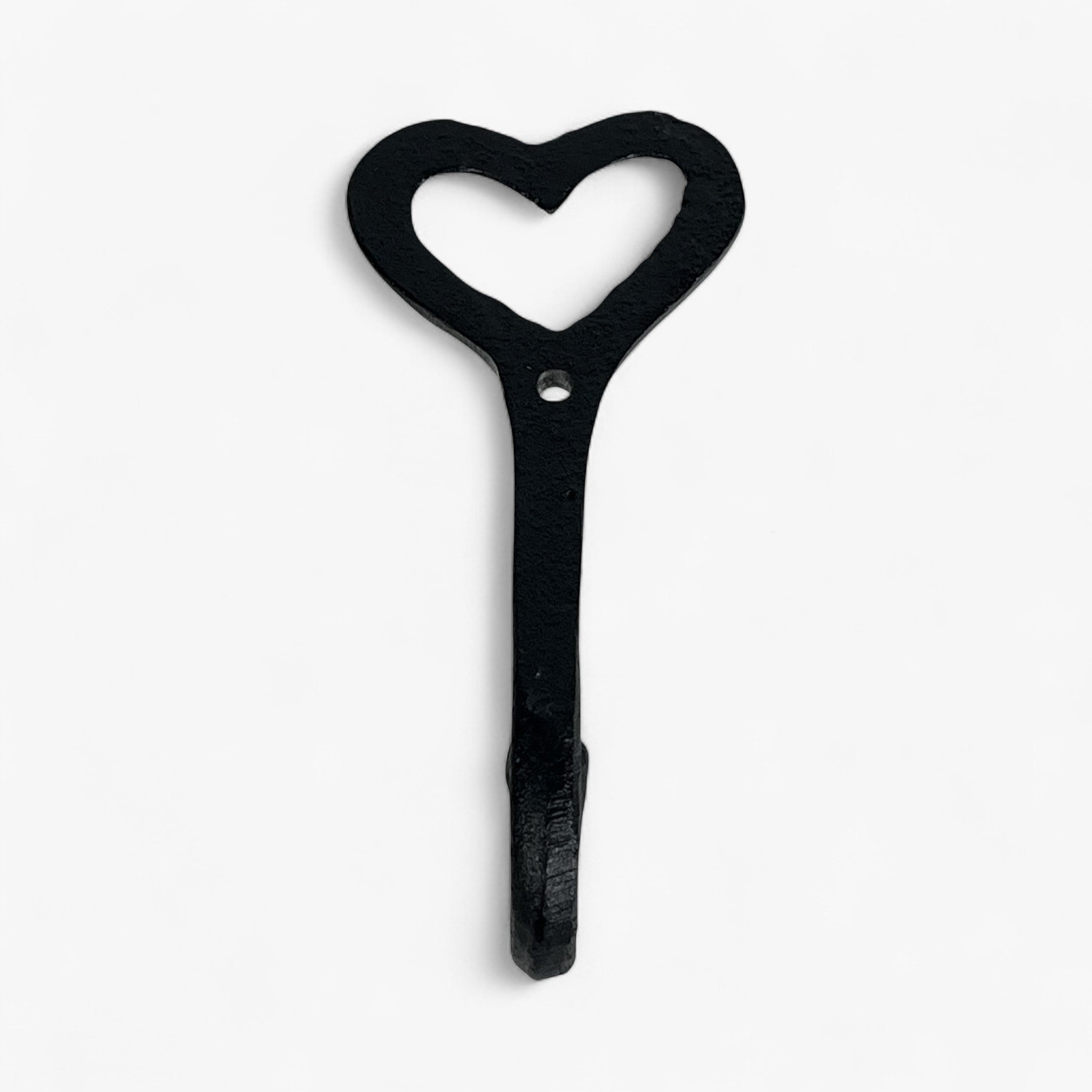 Black cast iron heart wall hook with mounting hole, rustic finish decorative hanger