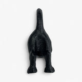 Black cast iron dog figurine front view, detailed texture, upright tail accent