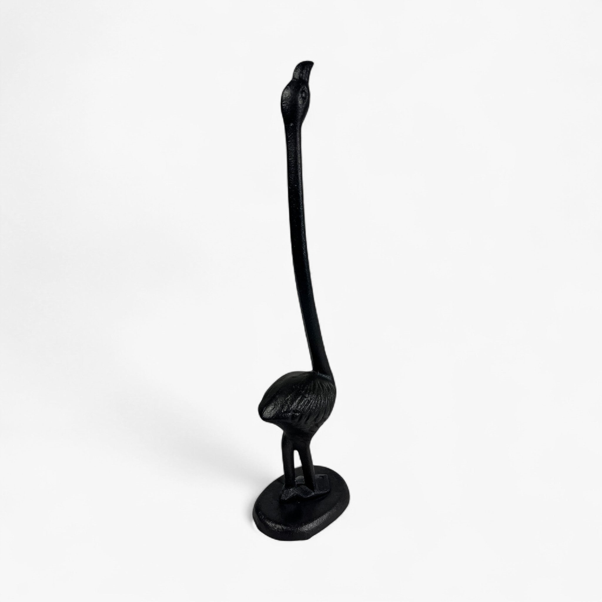 Black cast iron flamingo toilet paper holder with curved neck and round base