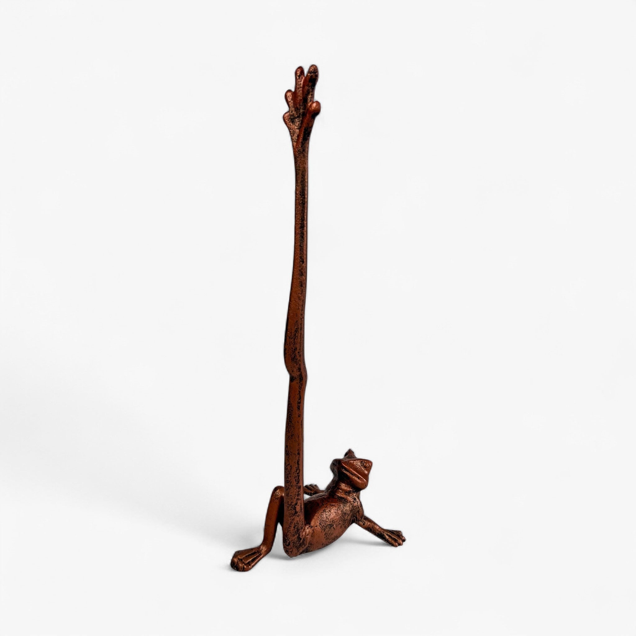 Cast iron frog paper towel holder weathered copper lying down position
