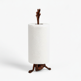 Weathered copper cast iron frog paper towel holder isolated view