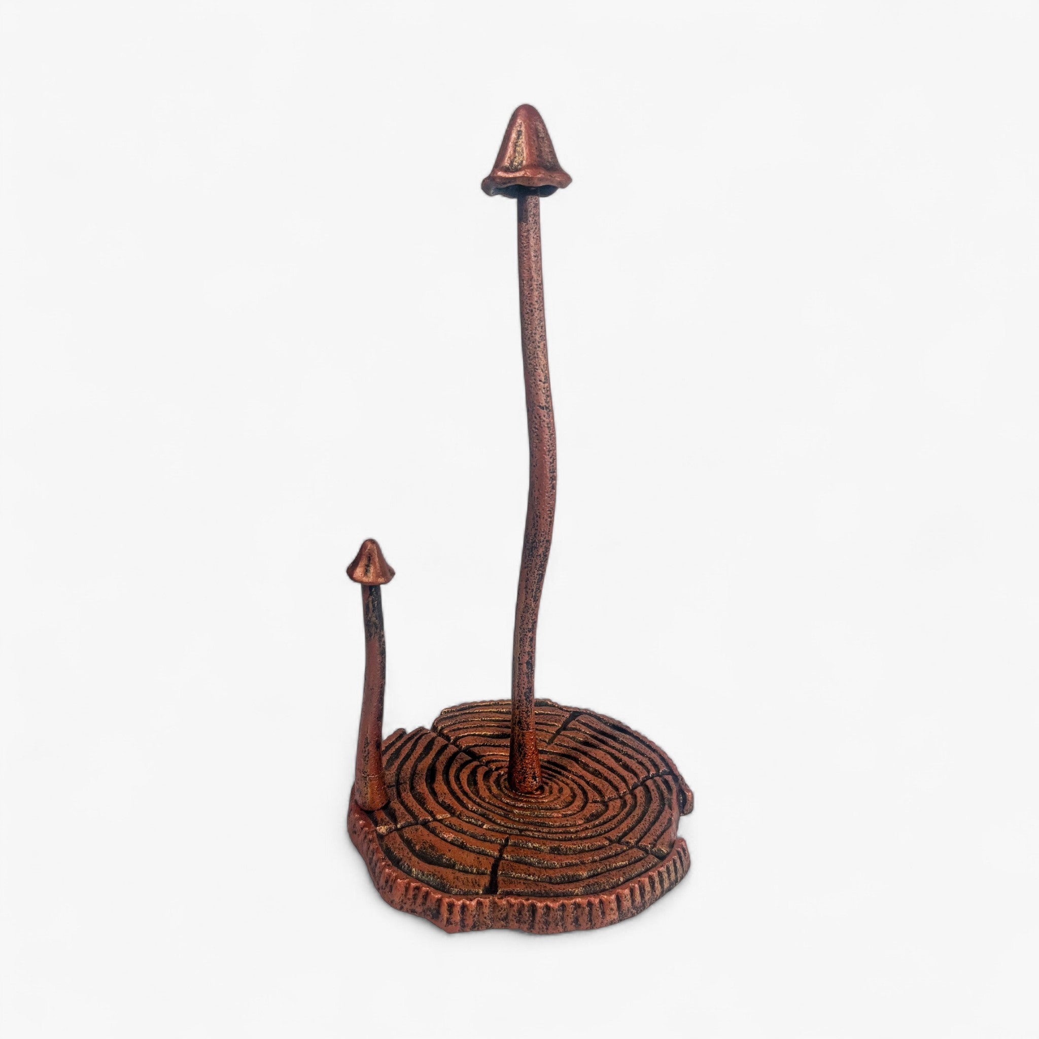 Cast iron mushroom paper towel holder with wood-ring pedestal base detail view