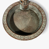 Metal wall art We Dont Call 911 sign with crossed revolver silhouettes and rope accents