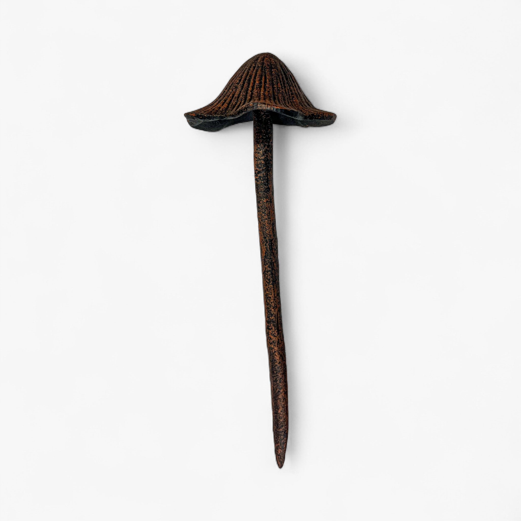Single mushroom garden stake with aged copper finish and wide flared cap top view