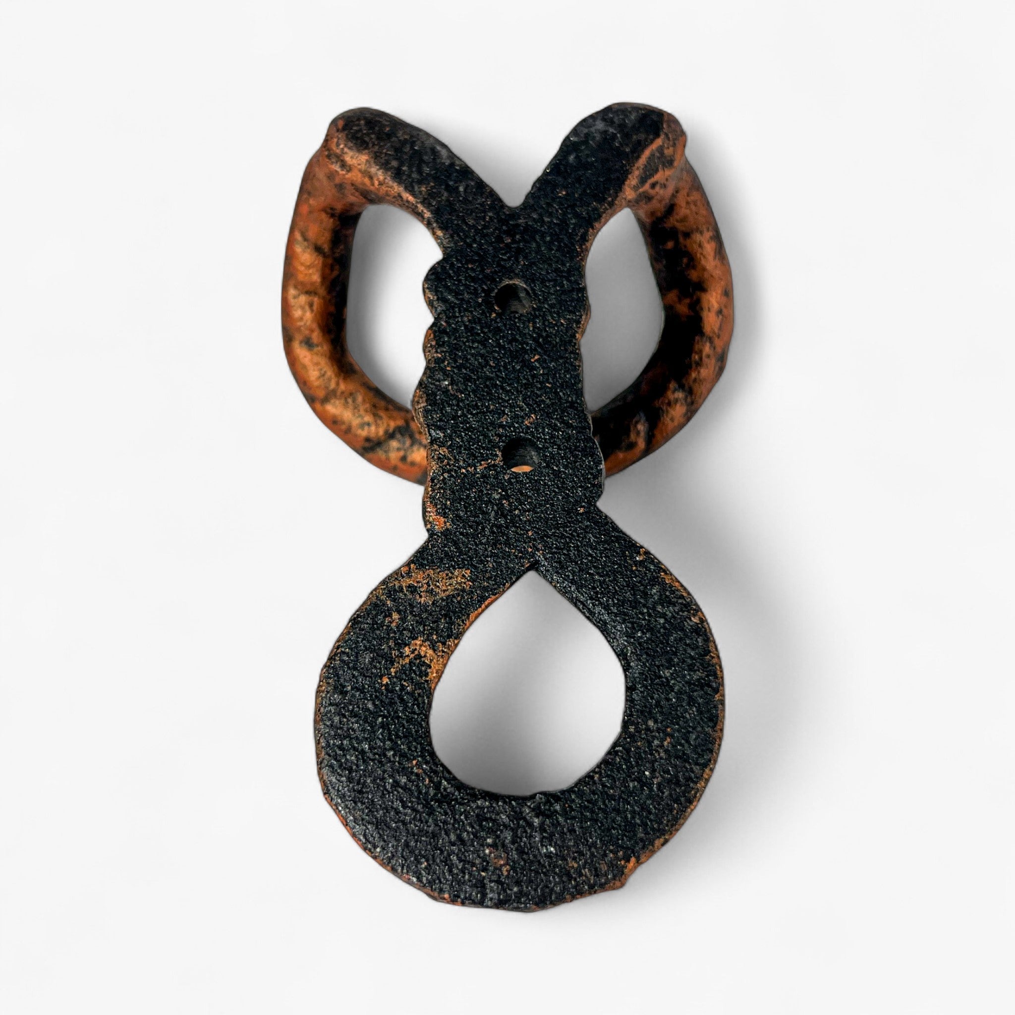 Dark metallic cast iron rope hook with rust accents and distressed weathered finish
