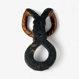 Dark metallic cast iron rope hook with rust accents and distressed weathered finish