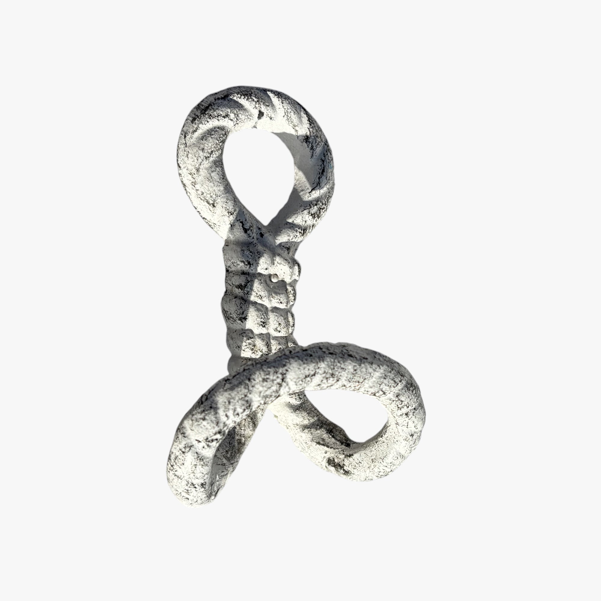 Whitewashed cast iron rope wall hook featuring textured surface and vintage patina