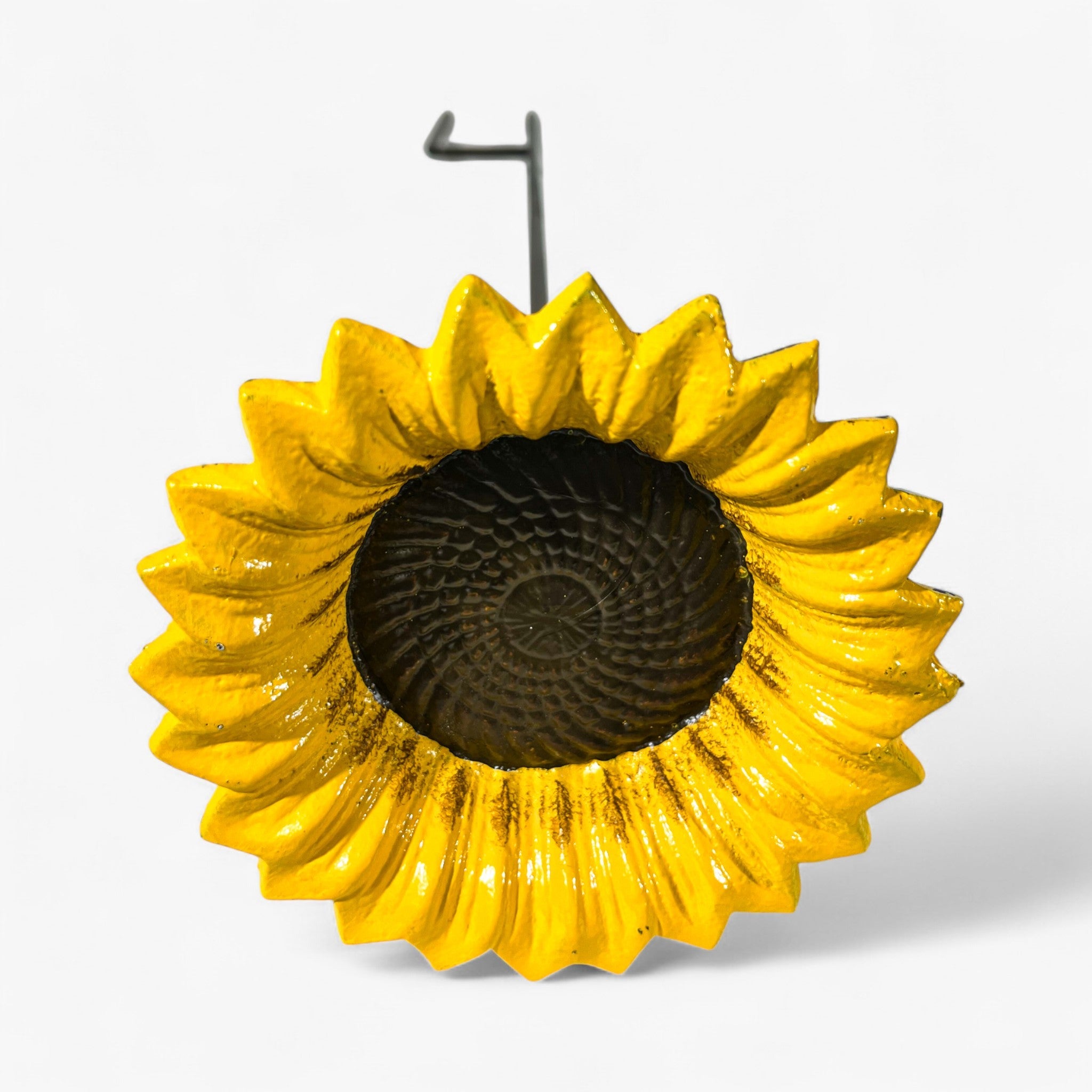Cast iron sunflower bird feeder, bright yellow petals, black center basin detail
