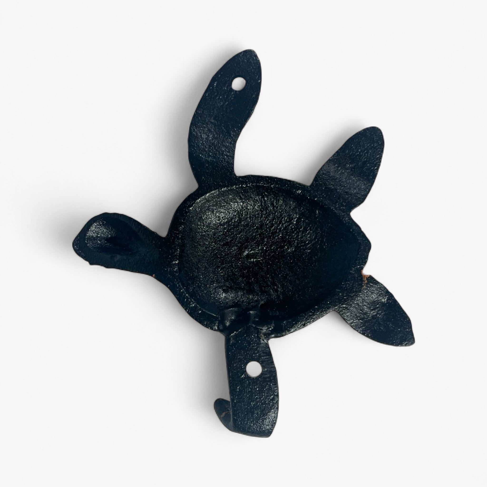Dark teal cast iron sea turtle hook with aged verdigris finish and textured arms
