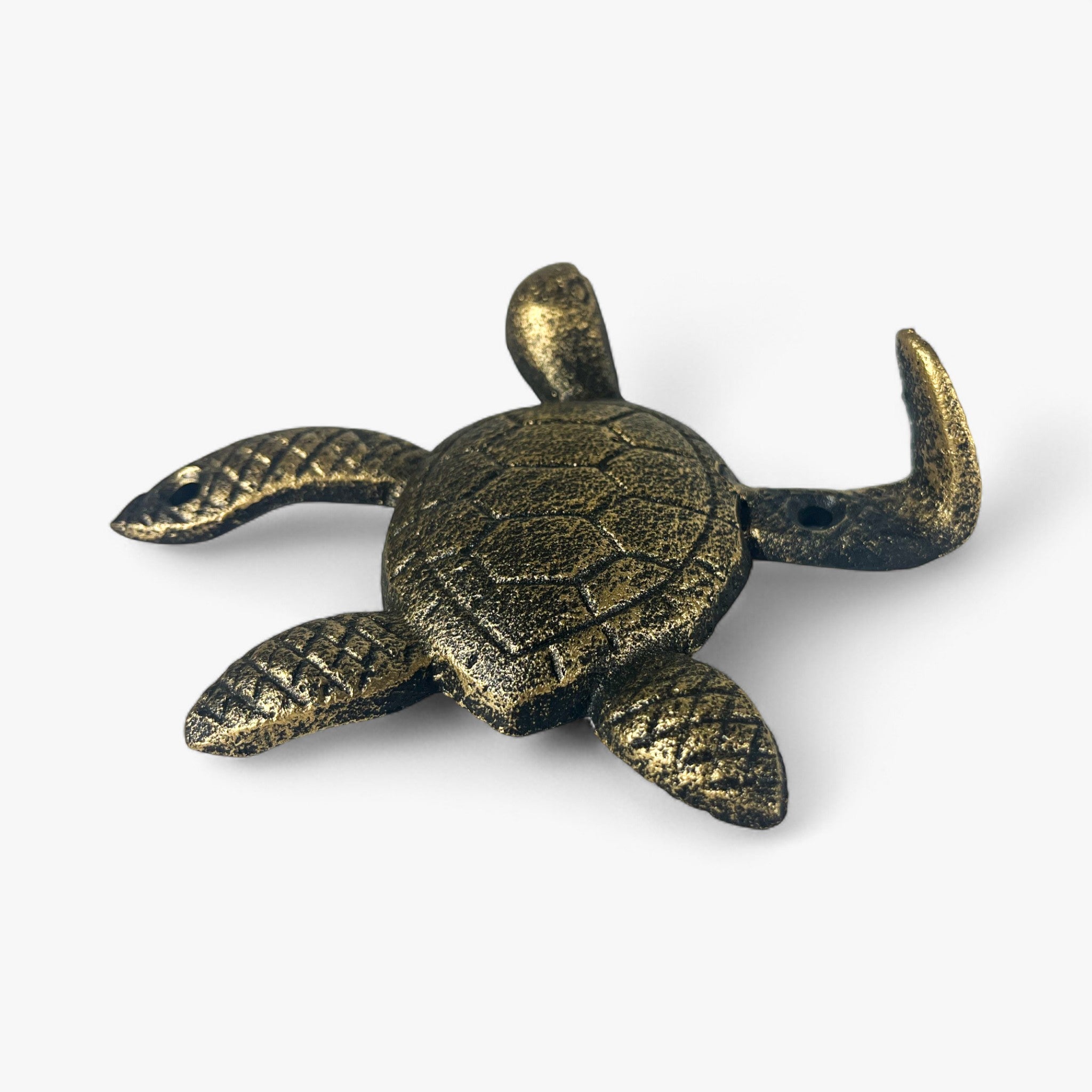 Antique brass cast iron sea turtle hook with distressed patina and dimensional shell relief