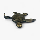 Coastal cast iron sea turtle hook with textured shell, spread limbs for hanging decor