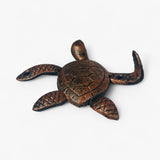 Bronze patina sea turtle wall hook with carved shell details and extended legs