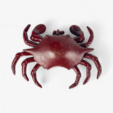 Burgundy cast iron crab key holder angled view showing hinged compartment and glossy patina