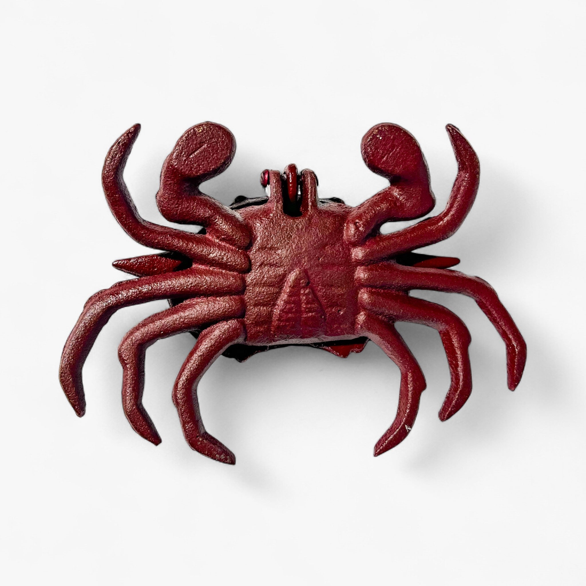 Red cast iron crab key hider with textured finish, coastal home decor