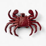Red cast iron crab key hider with textured finish, coastal home decor
