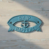 Turquoise cast iron Ship Happens nautical sign with anchor and banner detail wall decor