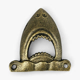Cast iron shark bottle opener detail showing textured jaw and functional opener mechanism