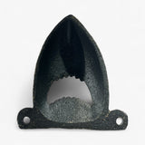 Black cast iron shark-shaped bottle opener with distressed vintage finish for bar decor