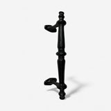 Full-length black cast iron door pull with dual handles and pedestal base, traditional style