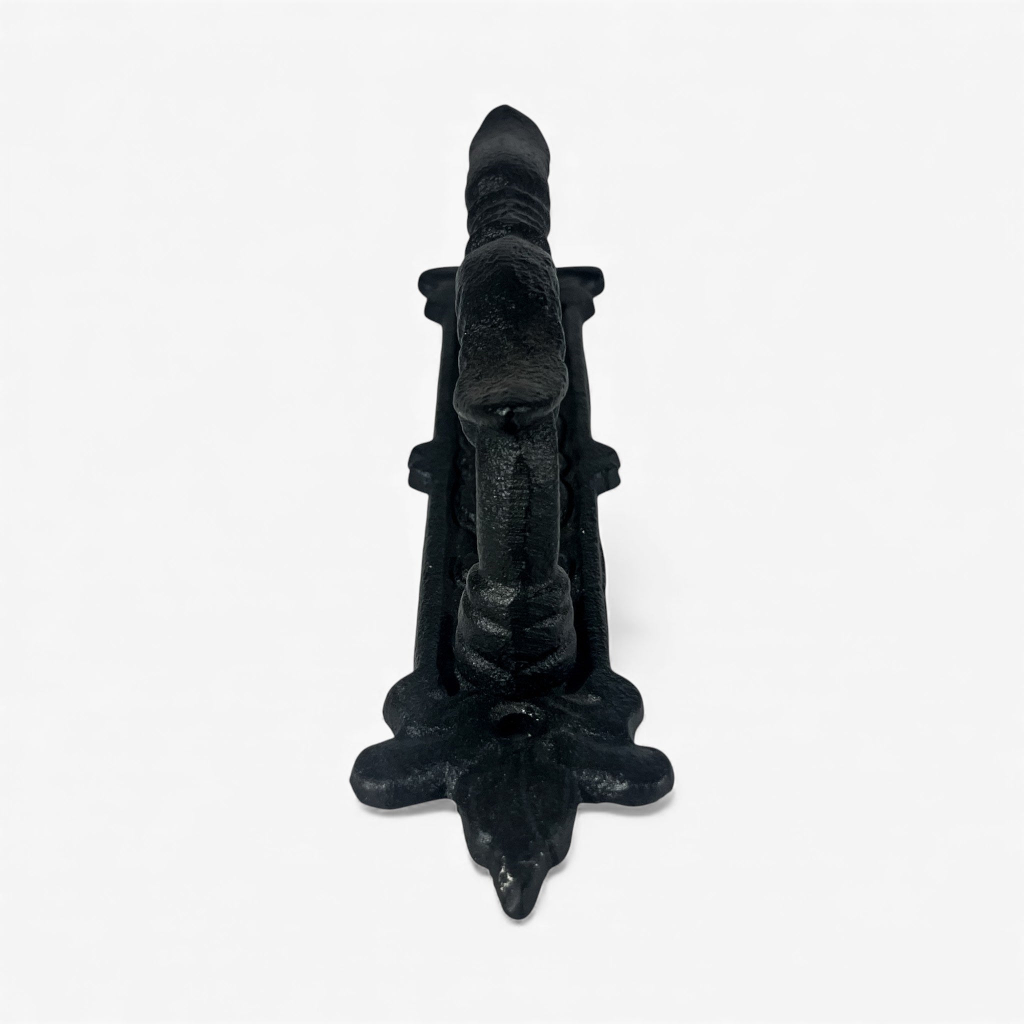 Cast iron door handle finial top view showing black weathered metal finish