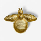 Gold bee dish top-down angle displaying segmented abdomen and intricate wing detailing