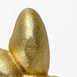 Gold bee trinket dish detail shot emphasizing textured cast iron material and glossy finish