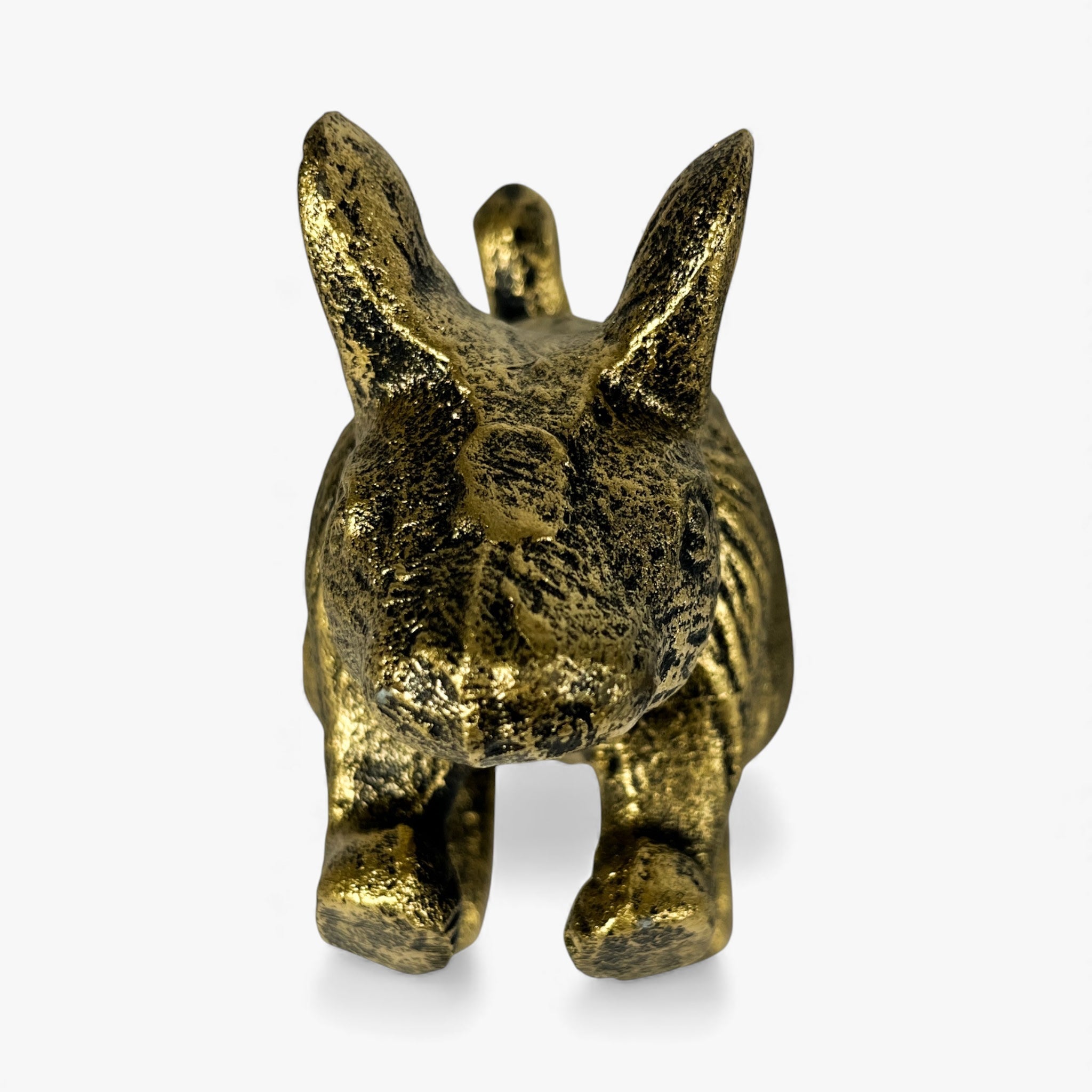 Front-facing gold cast iron mouse with texture detail and raised ears