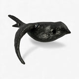 Black cast iron bird hook with mounting holes visible elevated side profile showing finish