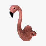 Pink cast iron flamingo wall hook from left angle showing curved neck