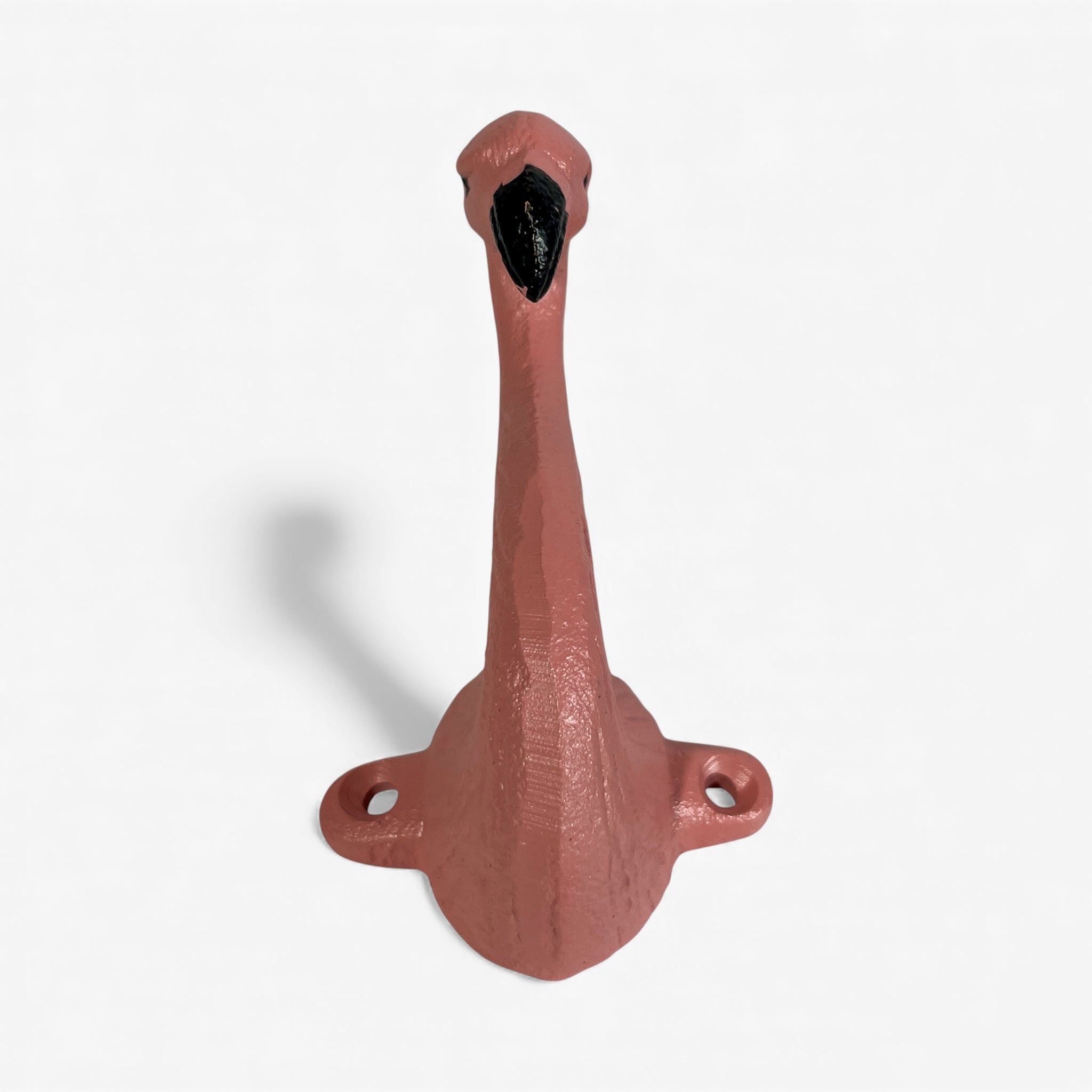 Pink cast iron flamingo hook with dual mounting holes, frontal view