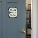 Black and cream cast iron staff only thank you sign, wavy shape door decor