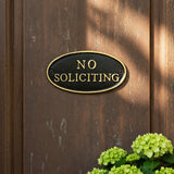 "No Soliciting" Oval Wall Sign, Cast Iron Black and Gold, 6.8" GB78045 shot 1