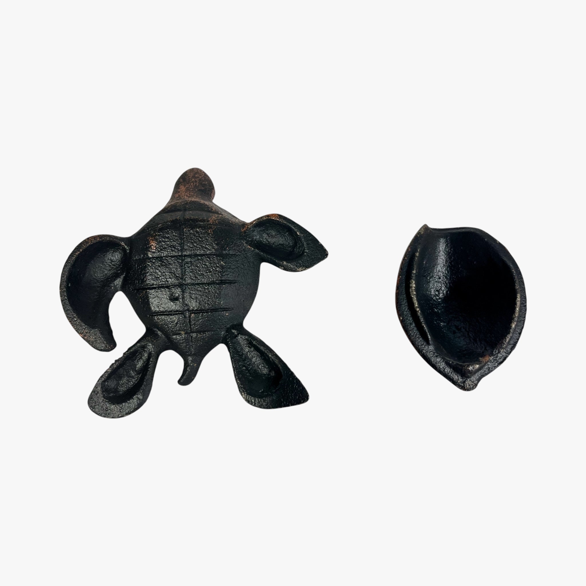 Aged black cast iron turtle figurine key hideaway showing weathered patina and shell compartment