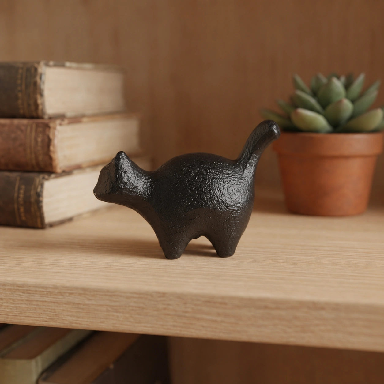 Side view of black cast iron standing cat paperweight, SKU GB78102