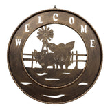 Closeup brushed copper pig welcome sign showing detail texture and windmill design