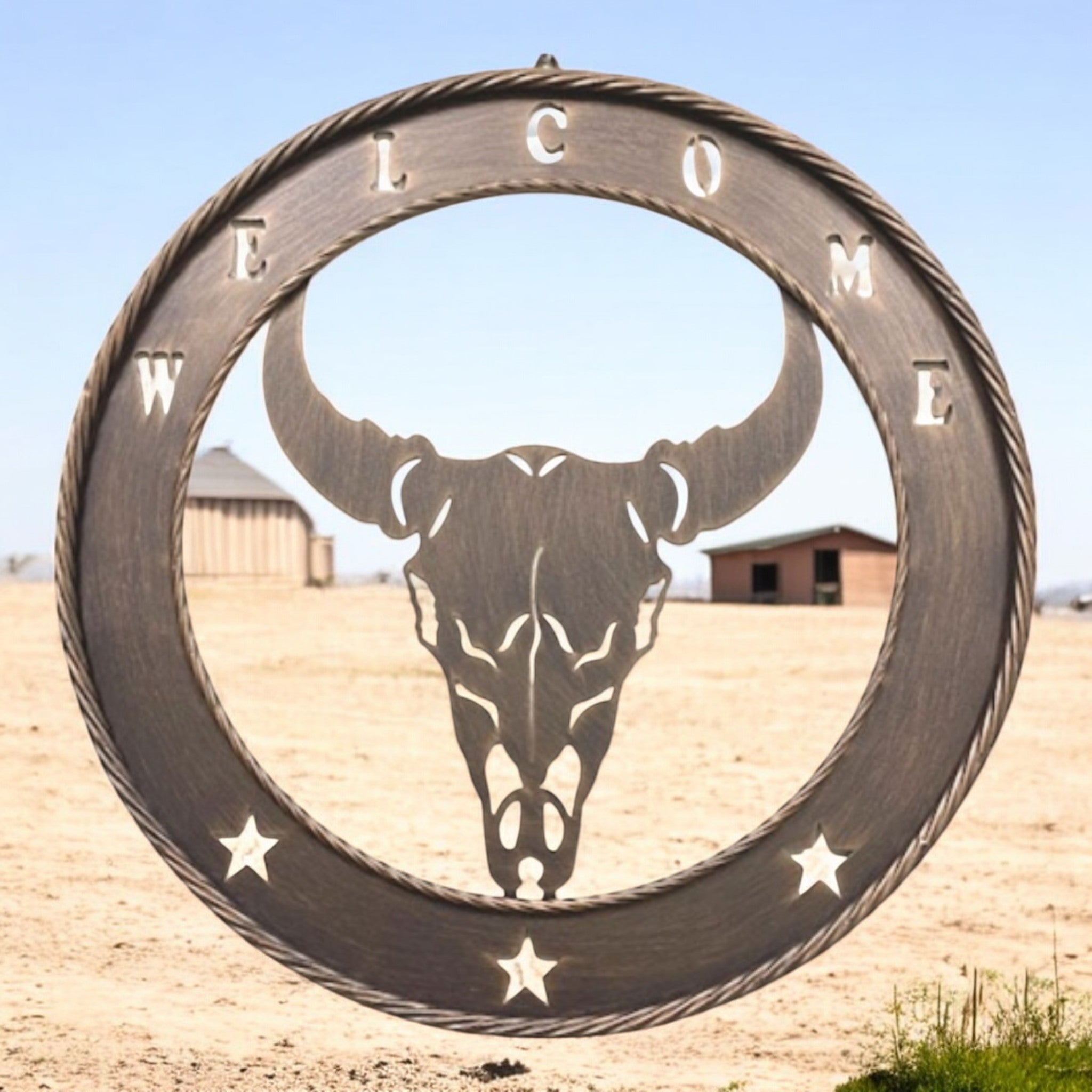 Rustic Welcome 23 inch laser cut metal wall sign featuring cow skull design