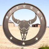 Rustic Welcome 23 inch laser cut metal wall sign featuring cow skull design