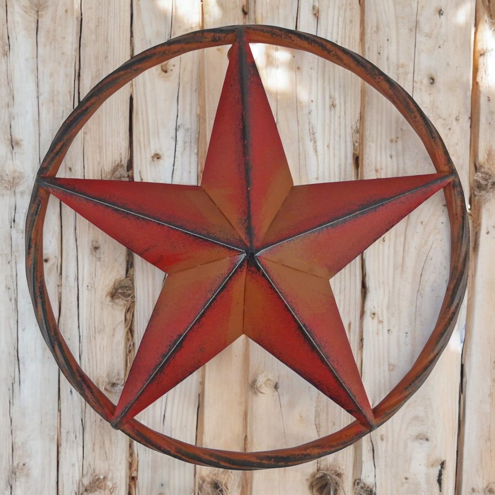Red rustic metal star decor with weathered finish, cast iron wall art