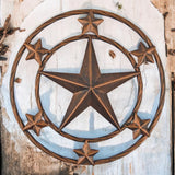 Rustic brown cast iron 12-inch star wall decor with surrounding stars